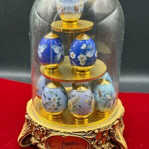 Faberge mini eggs in glass dome